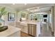 A well-appointed kitchen features a farmhouse sink, stainless steel appliances, and hardwood floors at 4106 Sweet Ivy Lndg # 179, Durham, NC 27703