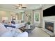 Comfortable living room featuring a fireplace and lots of natural light at 4106 Sweet Ivy Lndg # 179, Durham, NC 27703