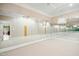 Spacious mirrored basement perfect for dance or gym with neutral carpet and view of a piano room at 4137 Gardenlake Dr, Raleigh, NC 27612