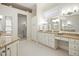 Elegant bathroom featuring dual sinks, granite countertops, and a walk-in glass shower at 4137 Gardenlake Dr, Raleigh, NC 27612