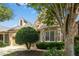 Beautiful stone home with lush landscaping, showcasing elegant architectural details and curb appeal at 4137 Gardenlake Dr, Raleigh, NC 27612