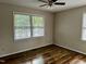 Cozy bedroom with hardwood floors and lots of natural light at 424 Shawnee Dr, Louisburg, NC 27549