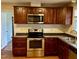 Updated kitchen featuring stainless steel appliances and hardwood floors at 424 Shawnee Dr, Louisburg, NC 27549