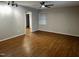 Living room featuring hard wood floors, ceiling fan, and neutral walls at 424 Shawnee Dr, Louisburg, NC 27549