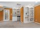 Basement with carpet, mini bar and built-in shelving at 44 Clarke Ct, Angier, NC 27592