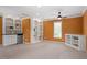 Basement with plush carpet, built-in bookshelves and mini bar at 44 Clarke Ct, Angier, NC 27592