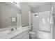 Full bathroom with single sink vanity, mirror, tub and shower at 44 Clarke Ct, Angier, NC 27592