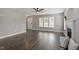 Spacious living area featuring hardwood flooring and a fireplace with a decorative mantle at 44 Clarke Ct, Angier, NC 27592