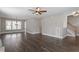 Open-concept living room with hardwood floors, recessed lighting, and abundant natural light at 44 Clarke Ct, Angier, NC 27592