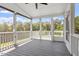Relaxing screened porch with comfortable seating and a view of the backyard at 44 Clarke Ct, Angier, NC 27592