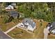 Aerial view of home showcasing its lush landscaping, neighboring properties and community at 623 Westfall Way, Chapel Hill, NC 27517