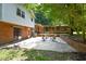Backyard with a patio, pergola, and lush greenery at 6308 Rolling Acres Drive, Gibsonville, NC 27249