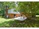 Backyard with a patio and lush greenery at 6308 Rolling Acres Drive, Gibsonville, NC 27249