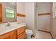 Bathroom with a wood vanity and shower with a glass door at 6308 Rolling Acres Drive, Gibsonville, NC 27249