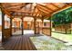 Gazebo with wood flooring and a swing at 6308 Rolling Acres Drive, Gibsonville, NC 27249