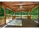 Gazebo with wood flooring and a swing at 6308 Rolling Acres Drive, Gibsonville, NC 27249