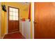 Laundry room with washer, dryer, and access to the outside at 6308 Rolling Acres Drive, Gibsonville, NC 27249