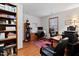 Functional home office featuring a desk, chair, and ample storage solutions at 651 Sagamore Dr, Louisburg, NC 27549