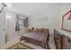 Comfortable bedroom featuring a sewing machine on a desk by a window, and traditional decor elements at 7020 Longstreet Dr # A, Raleigh, NC 27615