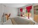 Comfortable bedroom with sliding doors to the patio at 7020 Longstreet Dr # A, Raleigh, NC 27615