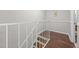 Interior hallway with staircase at 7020 Longstreet Dr # A, Raleigh, NC 27615