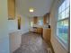 Functional kitchen with linoleum floors, stainless appliances, and ample natural light at 719 E Whitaker Mill Rd, Raleigh, NC 27608