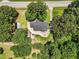 Expansive aerial view of a home, showing the driveway, landscaping and proximity to the road at 7722 Nc 27, Lillington, NC 27546