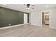 Spacious bedroom featuring neutral paint and ensuite bathroom entrance at 7722 Nc 27, Lillington, NC 27546