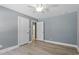 Bedroom with neutral walls and a ceiling fan at 7722 Nc 27, Lillington, NC 27546