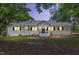 Charming single-story home with brick facade and well-maintained landscaping at 7722 Nc 27, Lillington, NC 27546