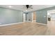 Expansive living room with recessed lights, hardwood floors, and lots of natural light at 7722 Nc 27, Lillington, NC 27546