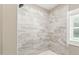 Bright bathroom featuring a walk-in shower at 7722 Nc 27, Lillington, NC 27546