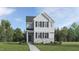 Charming two-story home with a well-manicured lawn, classic siding, and inviting front porch at 888 Cassa Clubhouse Way, Knightdale, NC 27545