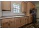 Bright kitchen with stainless steel appliances and granite countertops at 100 Cottonwood Ct, Kenly, NC 27542