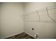 Laundry area featuring storage rack at 100 Cottonwood Ct, Kenly, NC 27542
