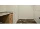 Functional laundry area with cabinet, countertop, and space-saving design at 100 Cottonwood Ct, Kenly, NC 27542