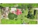 Aerial view of the farm featuring multiple paddocks and shelters to accomodate horses and other livestock at 1007 Windward Hill Ct, Middlesex, NC 27557