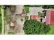 Aerial shot shows a horse property with multiple shelters and a paddock for comprehensive animal care at 1007 Windward Hill Ct, Middlesex, NC 27557