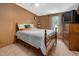 Bedroom with bed and TV, featuring neutral carpet, walls and curtains at 1007 Windward Hill Ct, Middlesex, NC 27557