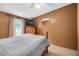Bedroom with TV featuring carpet and neutral walls at 1007 Windward Hill Ct, Middlesex, NC 27557