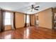 Primary bedroom featuring vinyl floors, two large windows for lots of light and ceiling fan at 1007 Windward Hill Ct, Middlesex, NC 27557
