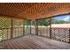 Comfortable screened porch features wood floors and lattice detail for relaxed, private outdoor enjoyment at 1007 Windward Hill Ct, Middlesex, NC 27557