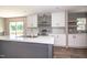 Open kitchen featuring island, stainless steel appliances, and plenty of counter space at 101 Cottonwood Ct, Kenly, NC 27542