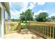 A new wooden backyard deck featuring a view of the lawn at 103 Cottonwood Ct, Kenly, NC 27542