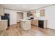 Charming kitchen with an island, stainless appliances, and great flow to living spaces at 103 Cottonwood Ct, Kenly, NC 27542