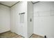 Bright laundry room with new floors and utility closet at 103 Cottonwood Ct, Kenly, NC 27542