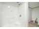 A clean, minimalist shower with built-in seating and modern fixtures at 103 Cottonwood Ct, Kenly, NC 27542