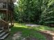 Spacious backyard offers grassy areas perfect for outdoor activities and enjoying nature at 106 Dodge Ln, Smithfield, NC 27577