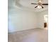 Spacious bedroom features a tray ceiling, ceiling fan, and neutral carpet at 106 Dodge Ln, Smithfield, NC 27577