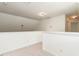 Spacious upstairs landing features neutral carpet and a view of the upstairs area at 106 Dodge Ln, Smithfield, NC 27577